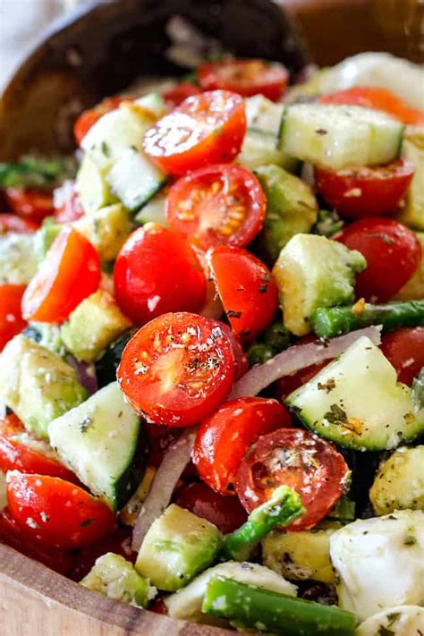 This tomato, cucumber, avocado salad is an easy, healthy, flavorful salad. Cucumber Tomato Salad with Avocado, Mozzarella & Asparagus