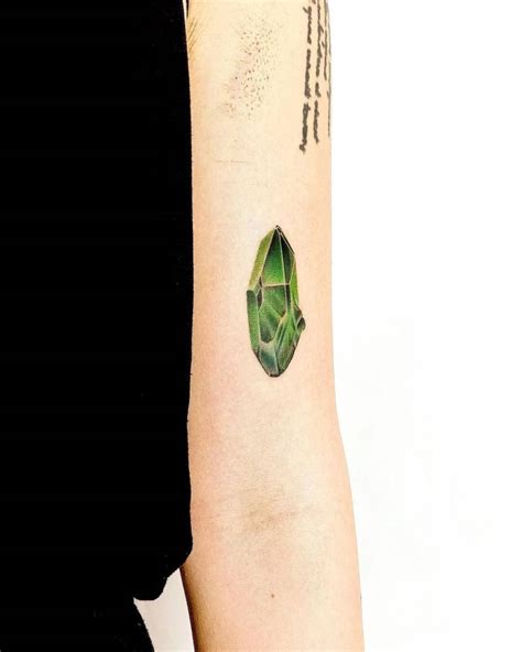 Micro Realistic Emerald Tattoo On The Bicep