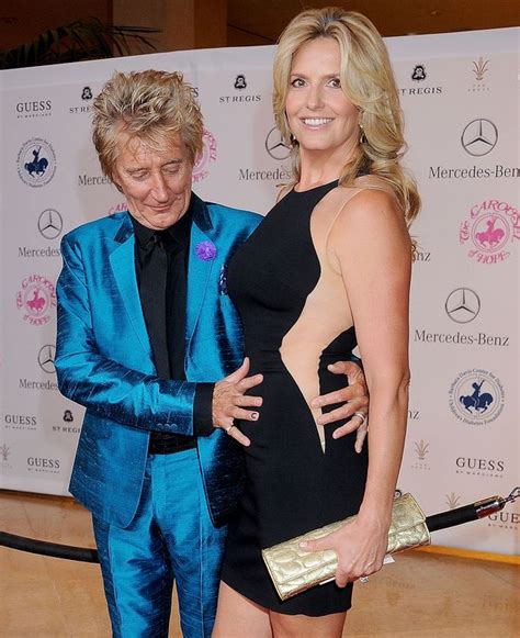 Rod Stewart Puts A Protective Hand On Wife Penny Lancasters Stomach At