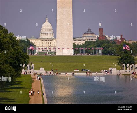Washington Dc Usa Reflecting Pool Washington Monument And U S Capitol