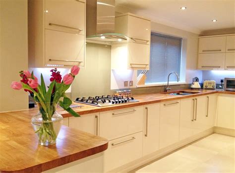 Large bespoke kitchen in a combination of walnut veneer and white gloss, created for a new build family home in co dublin. The 36 best Cream Gloss Kitchens images on Pinterest ...
