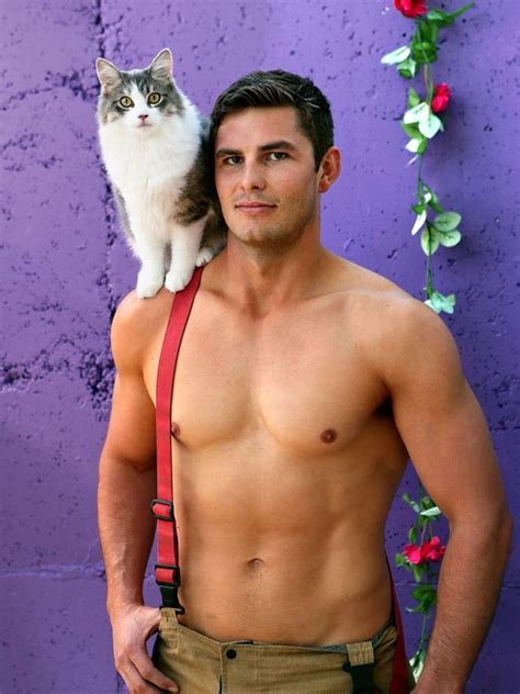 14 Very Visual Reasons Why You Need A Shirtless Firefighter Holding A