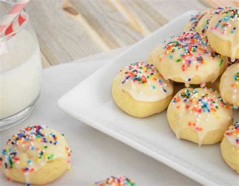 Italian anise cookies stand out on the cookie tray because of its glazed top and colorful sprinkles. Italian Anisette Cookies