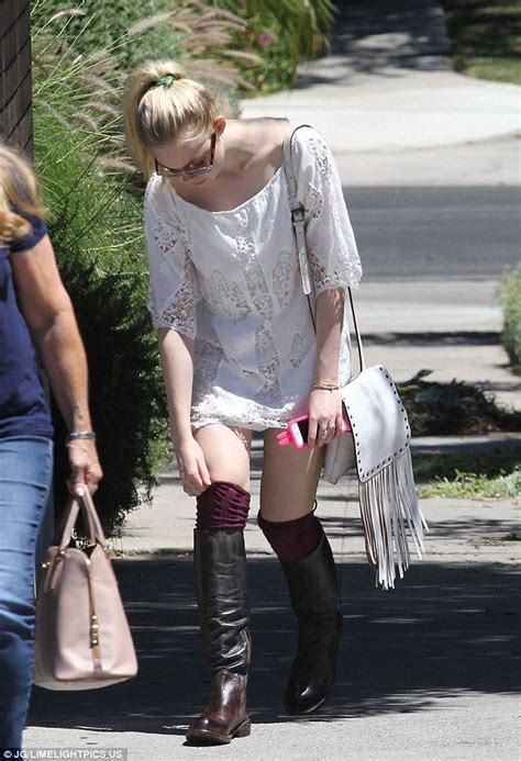 Elle Fanning Mixes Summery Crochet Dress With Chunky Leather Boots