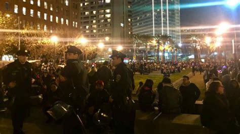 Large Crowd Police Presence Gather For New Years Eve Fireworks Along San Francisco Waterfront