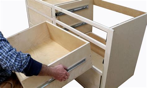 Measure the cabinet opening height (inside frame to frame) and subtract at least 1/2 from the opening height. Build Kitchen Cabinets & Install Drawer Slides - Free ...