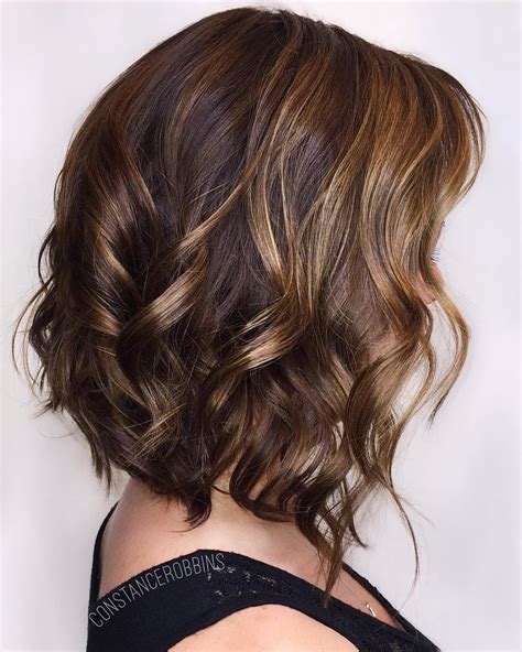 This hair color will also add dimension to a short sleek bob and will look great in both straight and curly hairstyles. 13 Beautiful Brown Hair with Blonde Highlights and Lowlights