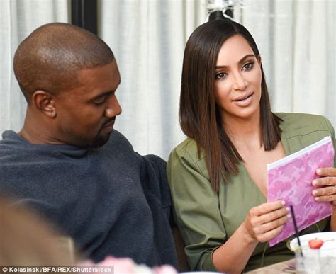 kim kardashian cosies up to kanye west as she flashes legs daily mail online
