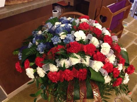 In the primary couple casket spray flowers years of the last century, casket arrangements were the member of the family of the deceased normally orders a plan called a casket spray for the top of the coffin. patriotic flower arrangements | Patriotic Casket Spray ...