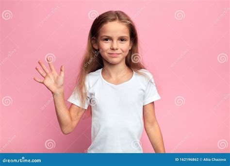 Little Smiling Beautiful Girl Waving Her Hand Saying Hello Hi Stock
