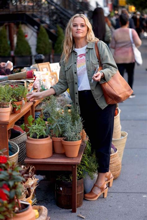 Reese Witherspoon S Graphic Tee Utility Jacket And Clogs Look For Less In Spring Jacket