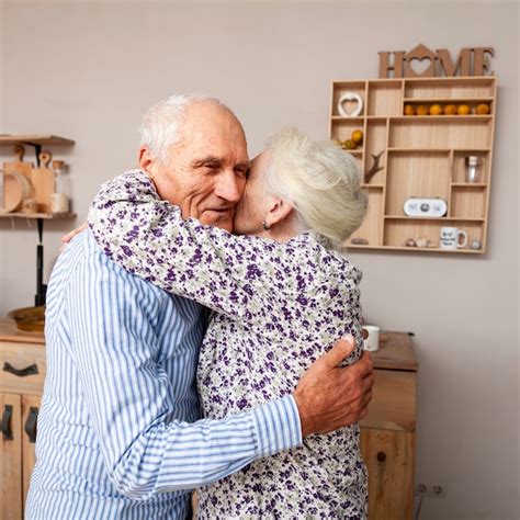 Free Photo Adorable Elderly Couple Hugging Each Other