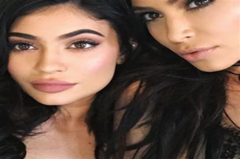 kylie jenner pregnant fans believe the 20 year old is being a surrogate mother for sister kim