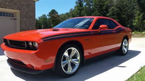 The 2013 dodge challenger executes that formula with solid determination and benefits from a little added something that is rare among its competitors: 2013 Dodge Challenger RT Classic 5.7L Hemi V8 Hemi Orange ...