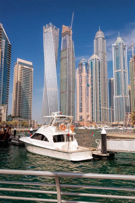 Dubai Marina With Boats Against Skyscrapers In Dubai United Arab