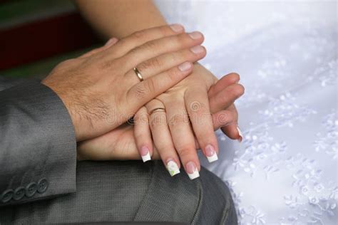 Bride And Groom Show Their Hands Wearing Wedding Rings Stock Photo Image Of Gold Ceremony