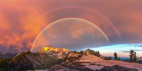 The Rainbow Over Stormy Mountains At Dusk Stock Image Image Of Rain