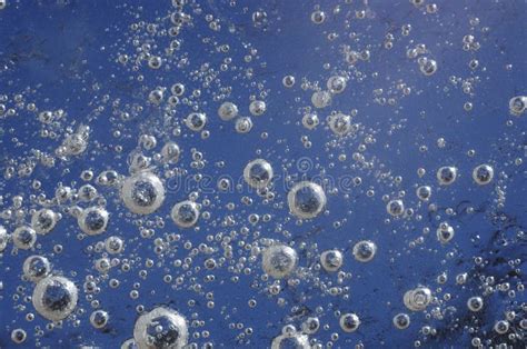 Air Bubbles In The Ice Lit By The Sun Stock Photo Image Of Pattern