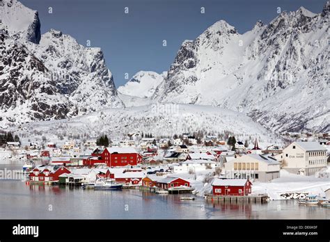 Robur Cottages At Fishing Village Reine In The Snow In Winter Moskenes