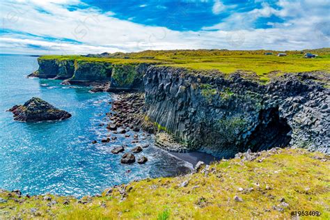 Beautiful Icelandic Landscape With The Cliff Of Basalt Rocks Formation