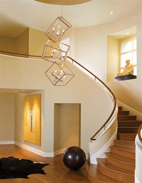 Interior Modern 2 Story Entryway Lighting Design With Unique Hanging