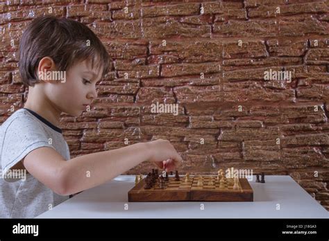 Kids Playing Chess Stock Photo Alamy