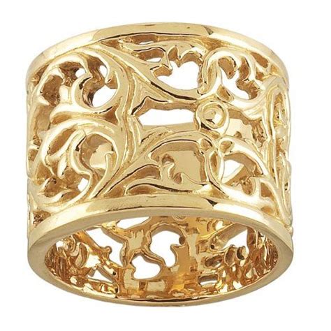Set with a slim band, this baguette wedding band has three baguette diamonds that sparkle from every angle—the 14k white gold pairs nicely with the diamonds to this large, square baguette ring is nothing but bold. 14k Gold Wide Filigree Unique Wedding Ring for Women ...