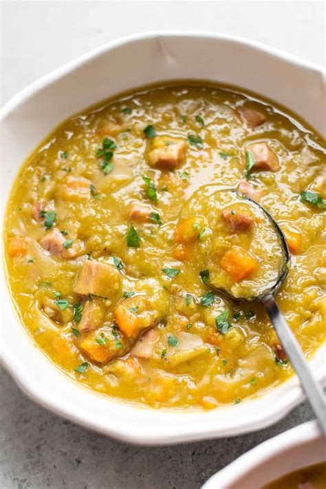Add the uncooked rotini along with the chicken broth, water, hot sauce, garlic powder, salt, pepper, and ground mustard to the pot. The BEST Instant Pot split pea soup (close-up in a white ...