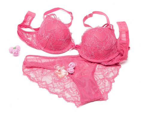 Premium Photo Sexy Lingerie Set Of Bra And Panty With Perfume And Small Rose Flowers On White