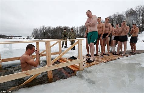Russian Orthodox Christians Take Dips In Icy Water For Epiphany Celebrations Daily Mail Online