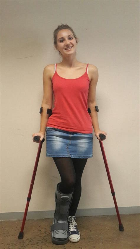 A Girl On Crutches Photo Crutches Walking Boots Girl