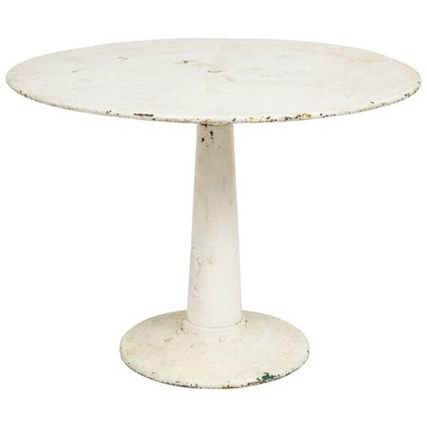 Metal dining room table and chairs victorian era dates. Round Rustic White Metal Pedestal Dining Table at 1stdibs
