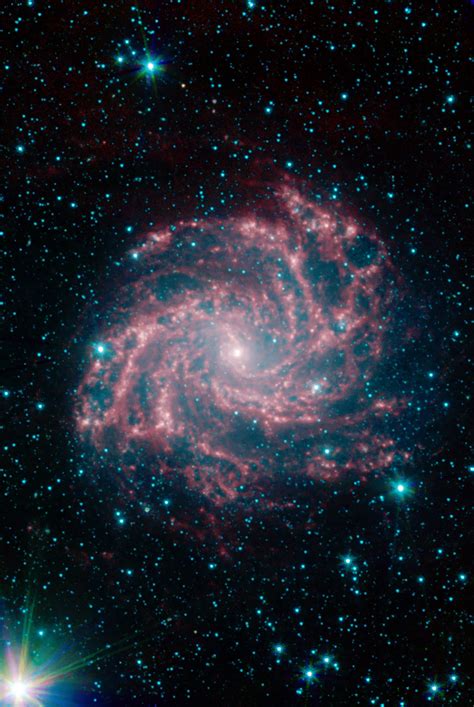 It is considered a grand design spiral galaxy and is classified as sb(s)b. Atlas of Peculiar Galaxies