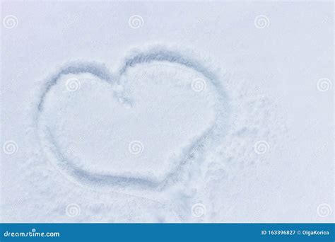 Snowy Heart On The Winter Surface Big Cold Heart Painted In The Snow