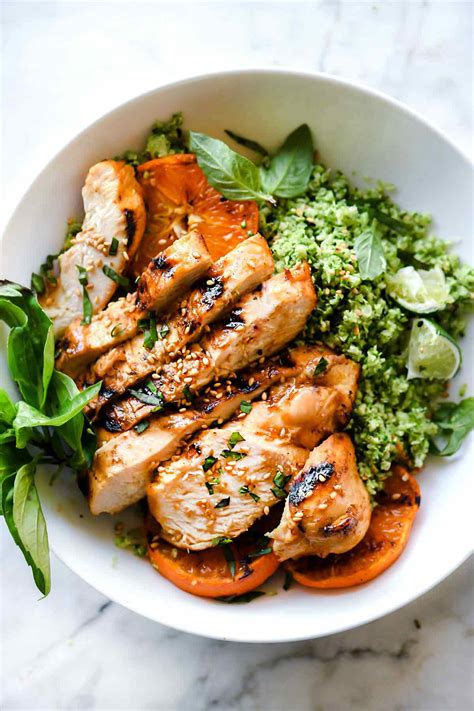 How to make cheesy chicken and rice with broccoli and carrots: Orange Chicken and Broccoli Rice Bowls | foodiecrush.com