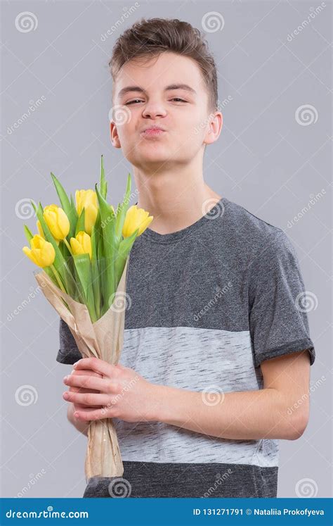 Teen Boy With Flowers Stock Image Image Of Love Birthday 131271791