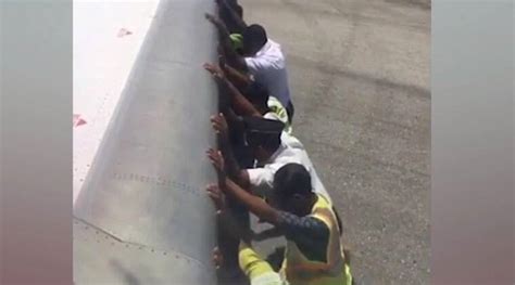 Men manually push 35,000kg plane along the runway in Indonesia; see pic | Trending News,The ...