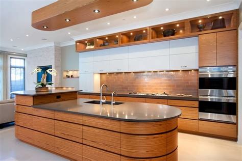 Oval Kitchen Island Complement The Interior With Elegant Curved Lines