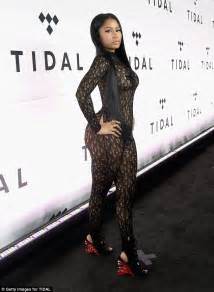 In the year, 2016, she had been included here she is seen with such long braided hair. Nicki Minaj puts everything on show in sheer lace ...