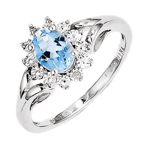 925 Sterling Silver Round Blue Topaz And Diamond Oval Flower Ring