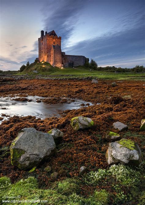 Dunguaire Castle Dunguaire Castle On The Picturesque Shores Of Galway