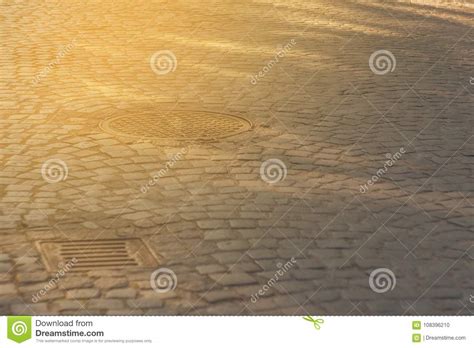 Old Granite Cobbles With Sewer Hatches Stock Photo Image Of Circle