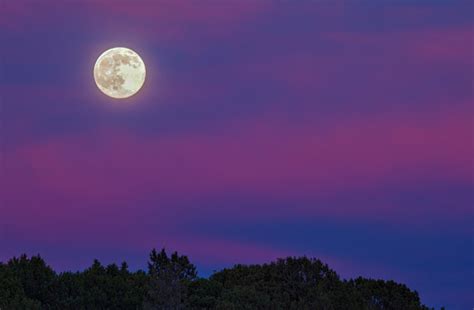 Full Moon At Sunset Stock Photo Download Image Now Istock