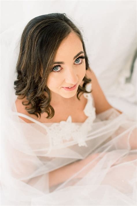 elegant bridal boudoir with long veil the white wren