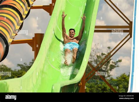 Man On Slide At Water Park Summer Vacation Stock Photo Alamy