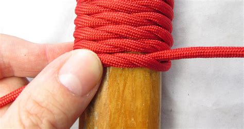 Wrap the left string (now on the right side) once around the right string. How to make a paracord handle wrap - Paracord guild