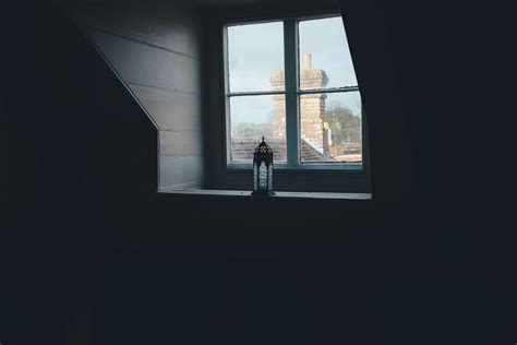 Photo Of Light Through Window Of Dark Room