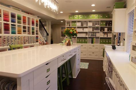 A Room Filled With Lots Of Drawers And White Counter Top Next To A Wall