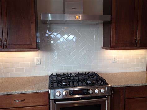 Maybe you would like to learn more about one of these? Gerard Homes Herringbone design in 3x6 subway tile ...
