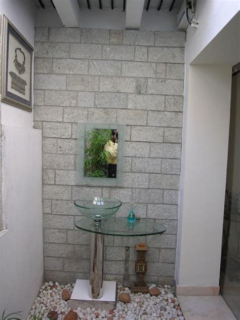 For hand wash in bath and dining hall. Wash basin planned in dining courtyard with stone clad ...